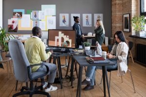 Creative professionals working in a modern office