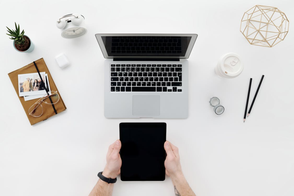 Overhead view of a workspace organized for press release writing and link planning.