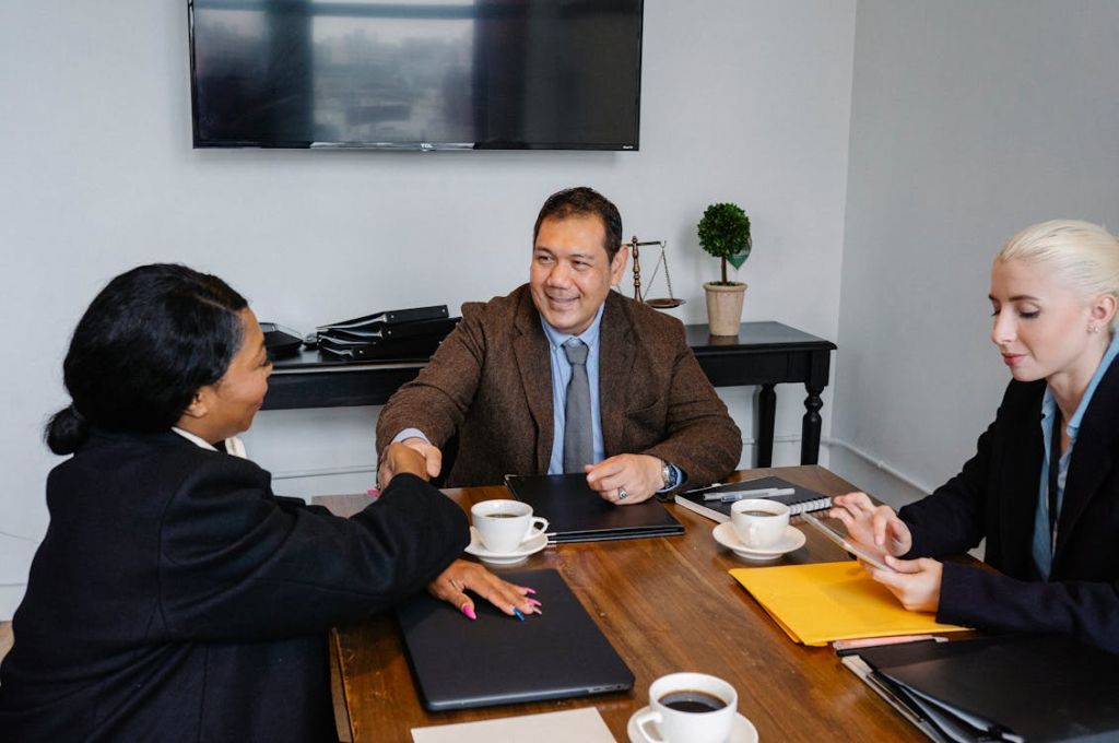 Executives finalizing a partnership deal, the kind of milestone that calls for an immediate release.